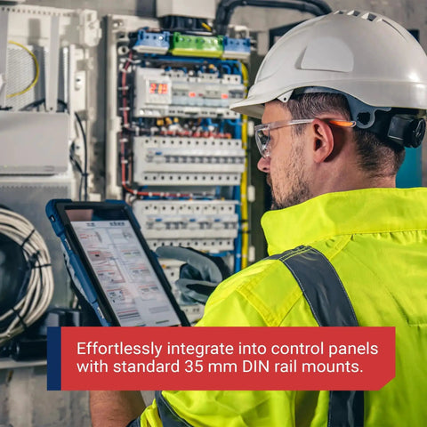 Technician using tablet in front of industrial control panel with IMACP02 Duplex Three Prong Modular Outlet DIN Rail Mount AC Receptacle
