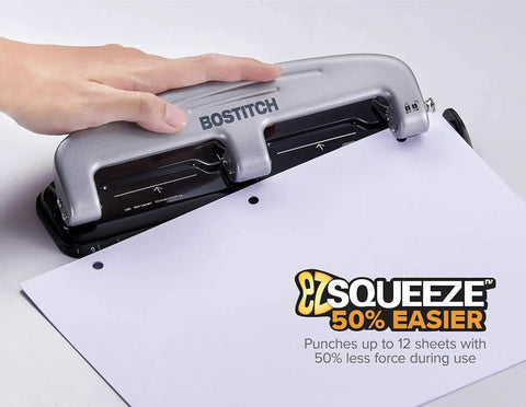 Person using EZ Squeeze Three Hole Punch For 12 Sheets No Jam 50 Percent Less Force Heavy Duty Metal Construction