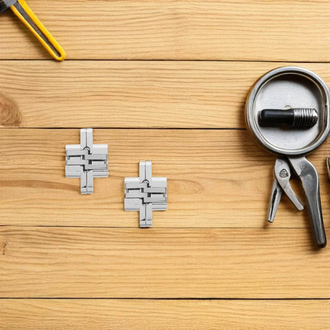 Tiny 43mm Zinc Alloy Concealed Door Hinges 4 Pack For Jewelry Boxes And Small Cabinets, displayed on wooden surface.