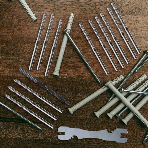 20 Pcs Stainless Steel Lag Screws Left And Right Handed For Cable Railing And Deck Post Hardware, displayed on a wooden surface.