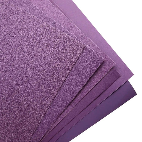 Close-up of purple 9x11 Inch Wet Dry Sandpaper Kit 24 Pcs Alumina Abrasive Grits 60 80 120 150 180 240 320 400 sheets