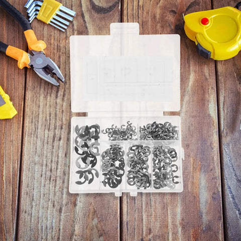 All In One Stainless Steel Hardware Kit Featuring 300 Pcs Open Split Washers And E Type Circlips 304 Stainless Retaining Ring Assortment For Indoor Outdoor Use Heavy Duty Rust Resistant Fasteners in plastic case on wooden surface