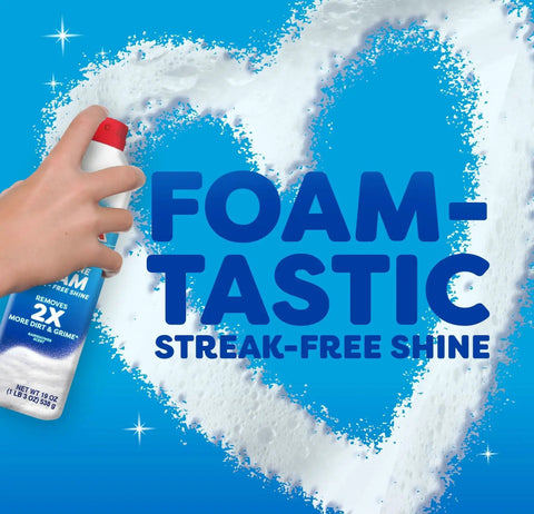 Hand using Fast Shine Foam Glass Cleaner No Drip Aerosol Spray 19 Oz Pack Of 2 creating heart shape foam on blue background.