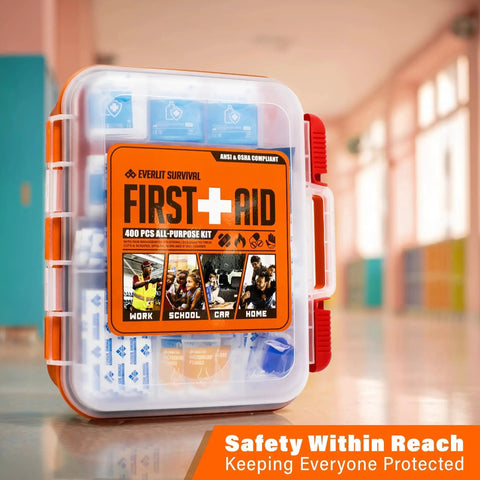 OSHA Compliant First Aid Kit With 400 Pieces in a clear hard case in a hallway setting
