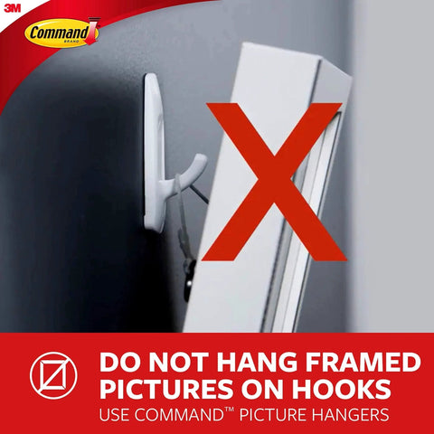 Illustration showing a prohibitive sign for hanging framed pictures on wall hooks with Command branding.