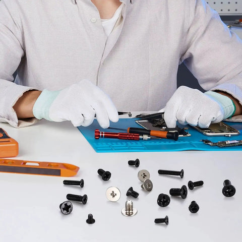 Person using 600 Pcs Tiny Screw Assortment Kit For Glasses Electronics Watches And Laptops M2 M2.5 M3 micro screws on a workbench
