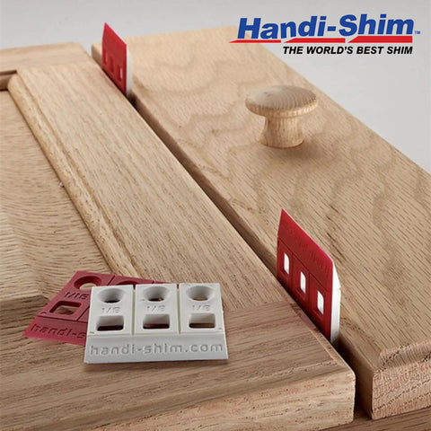 Heavy Duty Reusable Plastic Construction Shims For Spacing And Leveling Great For DIY Projects And Plumbing 40 Piece Pack One Eighth Inch White Handi Shim displayed with wood pieces for alignment.