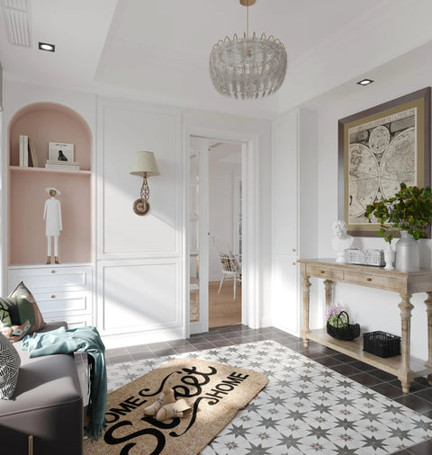 Interior room with decorative flooring, wall art, and a small sculpture on a shelf, featuring a 'home sweet home' rug.