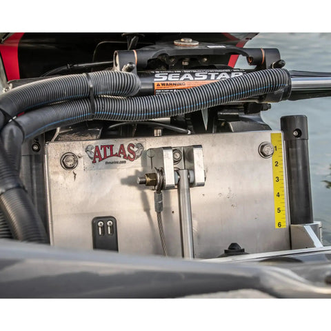 Outboard motor mounted using Heavy Duty Marine Jack Plate Bolt Kit with stainless bolts, lock nuts, and washers on boat.