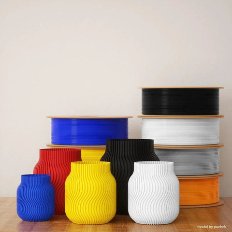 Black PETG Filament 1.75mm 1kg spools with colorful 3D-printed vases, shown for FDM printers high-speed printing.
