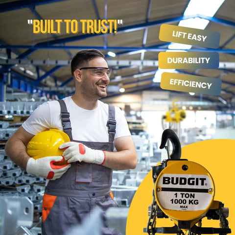 Worker holding helmet next to 1 Ton Pneumatic Chain Hoist With 20 Ft Lift and Pendant Control in industrial setting