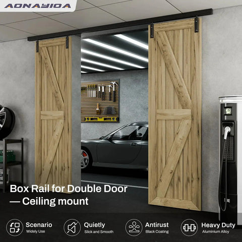 Ceiling Mount Box Rail Barn Door Hardware Kit For Double Doors installed in a garage, showing wooden doors on aluminum tracks.