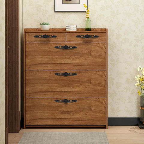 Antique Black Cabinet Pulls 2 Pack Classic Vintage Dresser Drawer Handles installed on wooden dresser in room