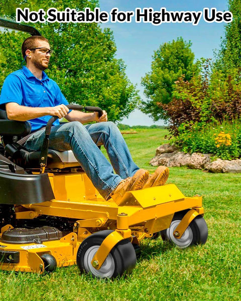 Man mowing lawn with zero-turn mower featuring Flat Free 11x6.00-5 Lawn Mower Tire And Wheel Set For Zero Turn Mowers Built Tough