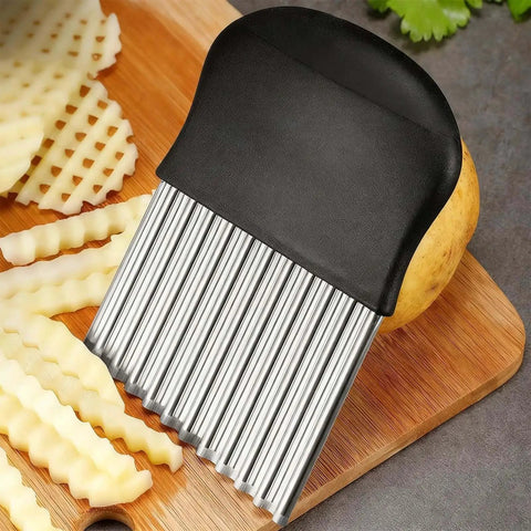 Crinkle Cutter For Veggies And Potatoes With Stainless Steel Blade And Ergonomic Non Slip Handle For Easy Boss Level Veggie Prep Sharp Wave Knife For French Fries And Veggie Slicing Multi Functional Kitchen Tool For Quick Cuts And Consistent Results shown on a cutting board with crinkle-cut potatoes