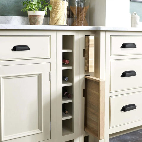Close-up of kitchen with 10 Pack Matte Black Cabinet Cup Pulls 5 Inch Hole Center 6.37 Inch Length installed on cabinet drawers.