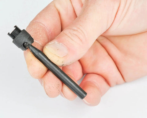 Universal Indicator Holder With Swivel Mount For Dial Indicators, 0.25 Inch Shank, held in hand, close-up view, Fowler product.