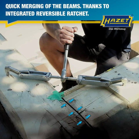 Person using Hazet Beam Puller 1774-1 I Clamps, Pulls And Compresses Timber to align wooden beams in construction.