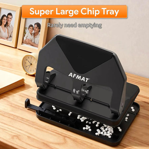 Heavy Duty Three Hole Punch 50 Sheet Capacity with super large chip tray on wooden desk