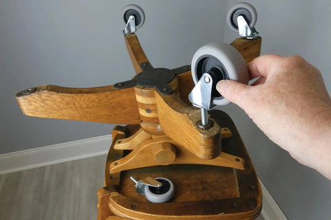Installing 3 Inch Threaded Stem TPR Caster With 110 Lb Load Capacity, Gray TPR Wheel On Black Polypropylene Hub on wooden stand