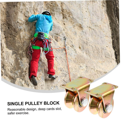 Beefy Two Pack Heavy Duty Sliding Door Pulley Block With Steel Wheel Track Roller for Gates and Shutters shown next to rock climber.