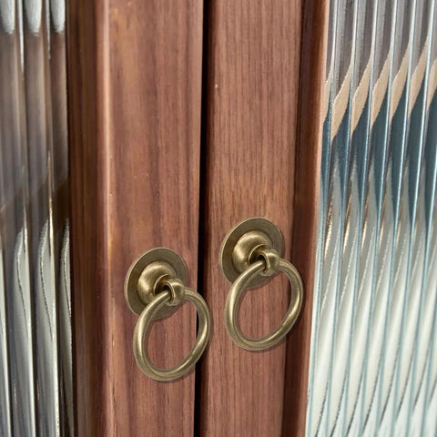Solid Brass Cabinet Ring Pulls Six Pack Antique Circle Drawer Pulls installed on wooden cabinet with vintage design