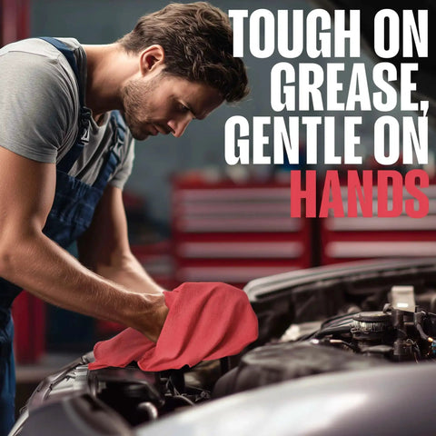 Mechanic using Cotton Shop Towels 12x14 Inch 100 Pack Ultra Absorbent Reusable Rags for auto cleaning in garage