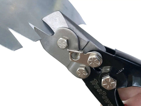 Close-up of 9-inch duct notcher tool for HVAC work, showing durable black and red finish and precise cutting mechanism.