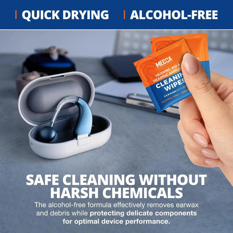 Hand holding alcohol-free hearing aid cleaning wipes next to open hearing aid case on table