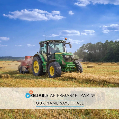Tractor towing equipment in a hay field, promoting Reliable Aftermarket Parts, emphasizing quality agricultural machinery.