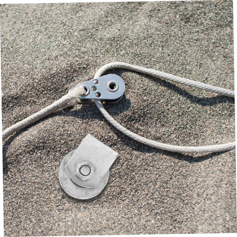 Rugged Cast Iron V Type Groove Wheel Garage Door Roller and rope on sand