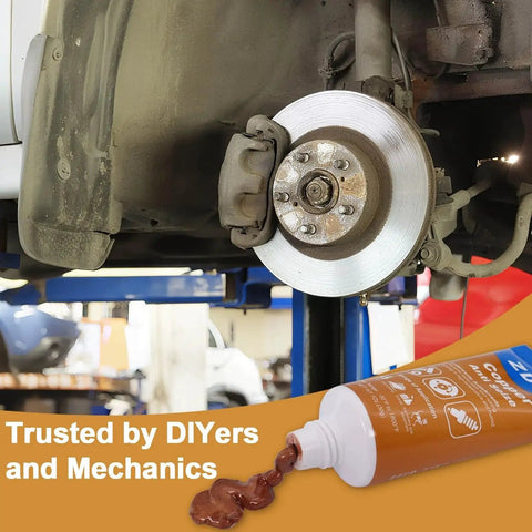 Copper Anti Seize Thread Lubricant for High Temp Automotive And Marine Use 1 oz shown beside car brake rotor and caliper