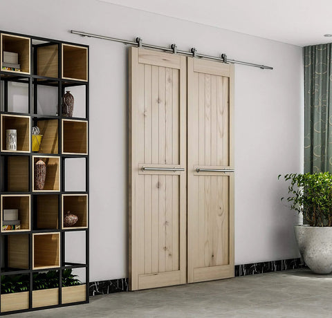 10 Foot Brushed Stainless Steel Double Sliding Barn Door Hardware Kit With Soft Close Top Mount Rollers For Indoor Bi Parting Track Fits Doors From One And Three Eighths Inches To One And Three Quarters Inches installed on wooden doors in living room.