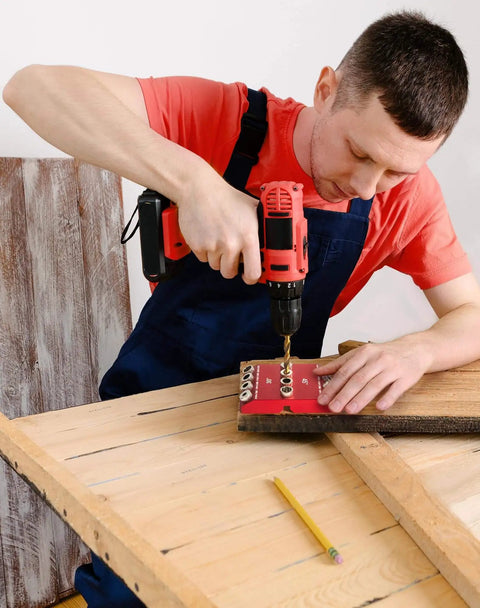 Man using Pro Grade 30 Degree 45 Degree 90 Degree Angle Drill Guide Jig for Hand Drills to drill angled holes in wood