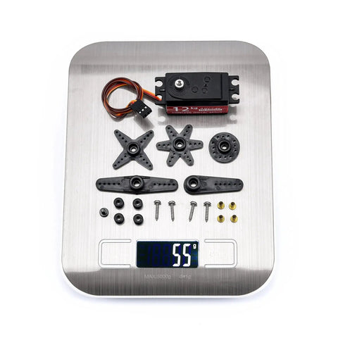 Readytosky 12kg waterproof servo motor kit with metal gears and arm linkages on a digital scale