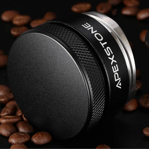 Close-up of Apexstone 53mm coffee distributor leveler with knurled metal grip for 54mm Breville portafilter