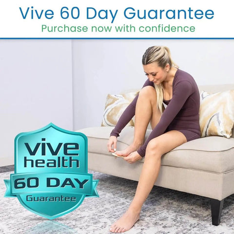 Woman applying Toe Straightener Splint Pair For Hammer Toe Correction And Claw Toe Relief All Day Comfort on couch