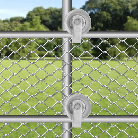 5 Inch Sliding Gate Rollers Galvanized Steel For One And Five Eighths Inch Pipe Track Pack Of Two Durable For Smooth Low Resistance Gate Operation And Long Lasting Corrosion Resistant Performance installed on a chain-link fence.