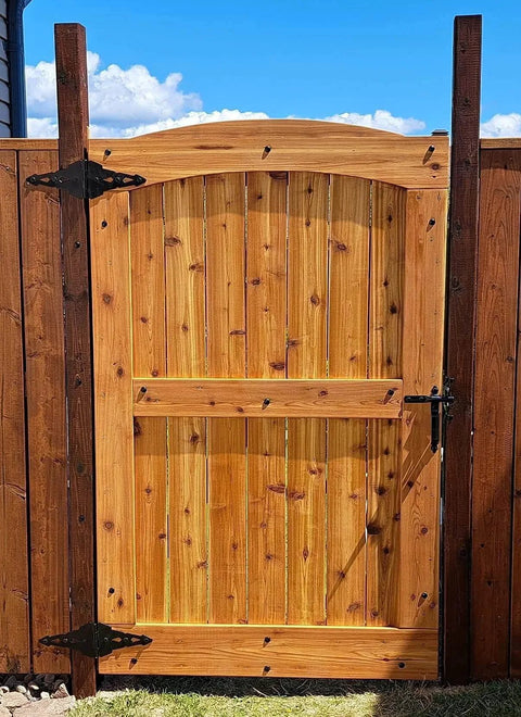 Wooden gate with 8 inch heavy duty black hinges from a six pack; includes screws and mounting hardware for barns and outdoor use.