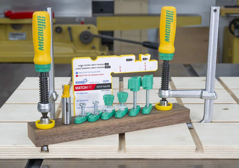 Matchfit Dovetail Clamp Pro Router Bit Kit with one half inch shank and fourteen degree bit on display with setup gauge