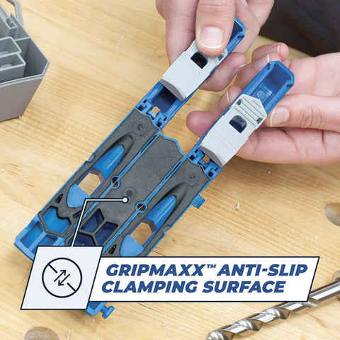 Pocket Hole Jig 320 with anti-slip clamping surface, compact design shown with drill bit and hands adjusting the tool.