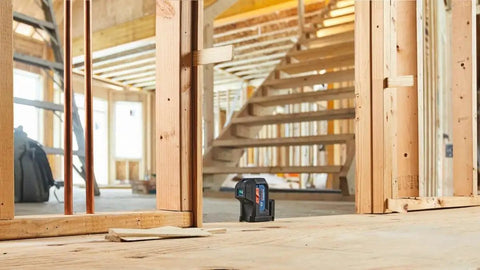 Green Beam Self Leveling Alignment Laser Pro Grade With Plumb And Level Point Projection Built In Multipurpose Mount Visimax Technology For Extended Battery Life on construction site floor includes 2 AA Batteries And Hard Carrying Case