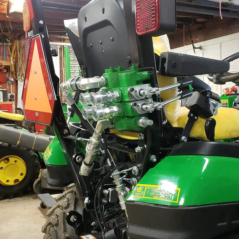 Tractor with installed Heavy Duty 1/4 Inch NPT ISO 7241 B Hydraulic Quick Connect Couplers and hoses