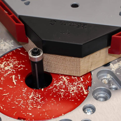Close-up of Corner Radius And Chamfer Router Jig With 8 Slick Profiles, Built-In Storage, And Dual Bearing 1/2 Inch Router Bit Included
