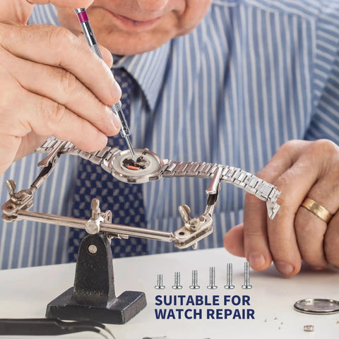 Person using Bulk 500 Pcs Laptop Screws Set in M1.2 M1.4 and M2 for watch repair with tools on a desk.