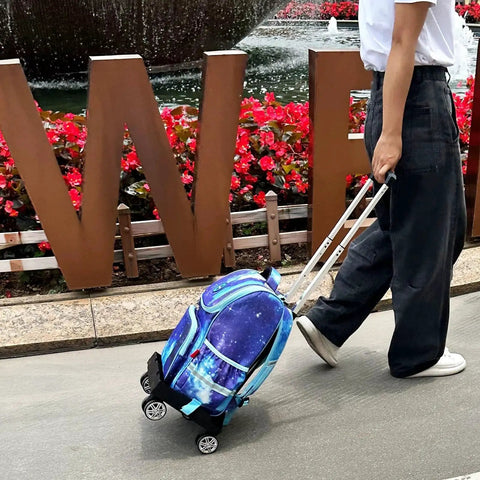Person pulling a foldable aluminium alloy wheeled backpack trolley with edge guard base and four spinner wheels luggage cart outdoors.