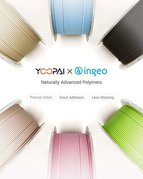 Overhead view of multiple spools of 3D printer filament in various colors, showcasing naturally advanced polymers.