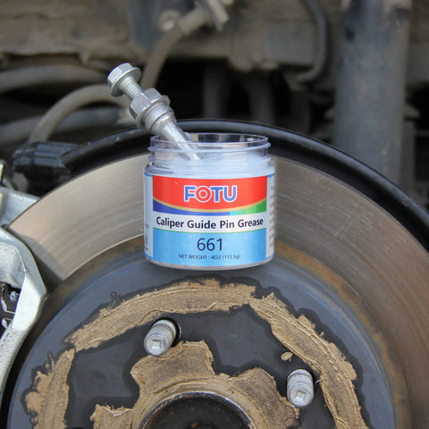 FOTU Caliper Guide Pin Grease 661 jar with metal applicator on brake rotor