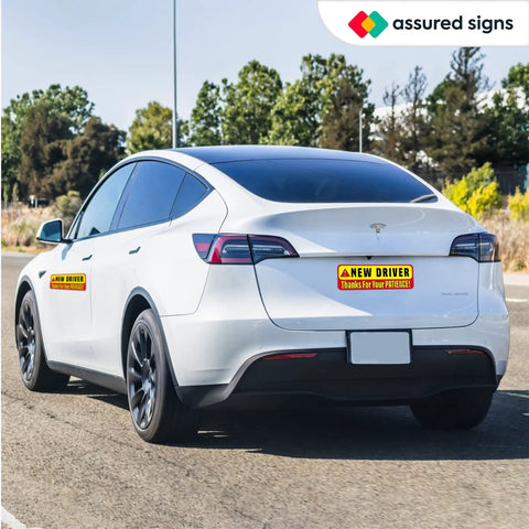 Extra Large Driver Sign For Car 3 Pack Magnetic Bumper Stickers Yellow Reflective Road Safety Sign For Learners And Beginner Drivers Fits Most Vehicles on a white car.