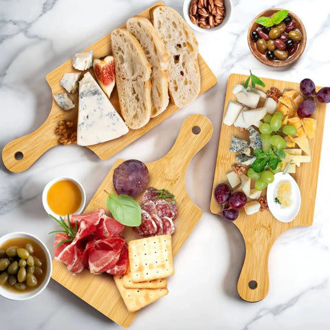 12 Pack Bamboo Cutting Boards With Handles 11 By 5 Inch Mini Charcuterie Boards For Kitchen Prep And Serving with food items